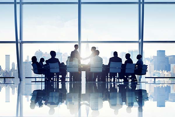 conference room with silhouetted people